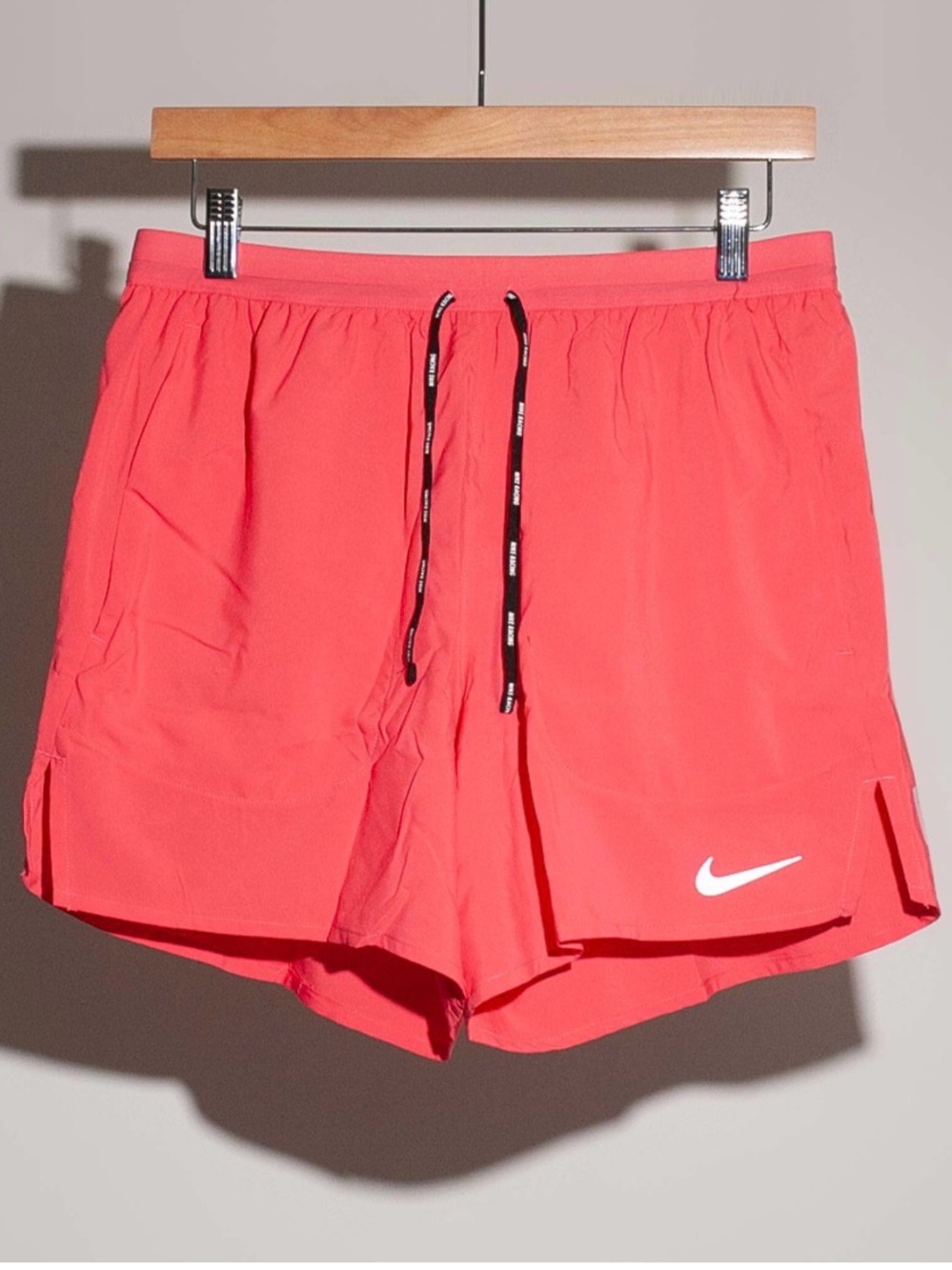 Nike Coral Athletic Running Shorts with White Swoosh
